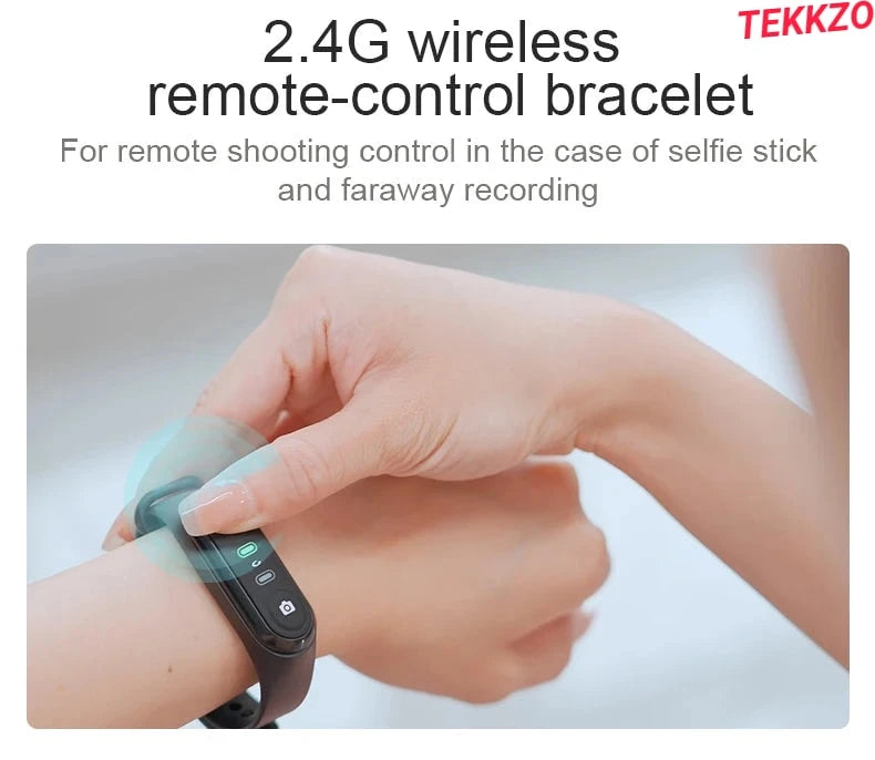 Hand wearing a black 2.4G wireless remote-control bracelet for selfie stick and remote shooting