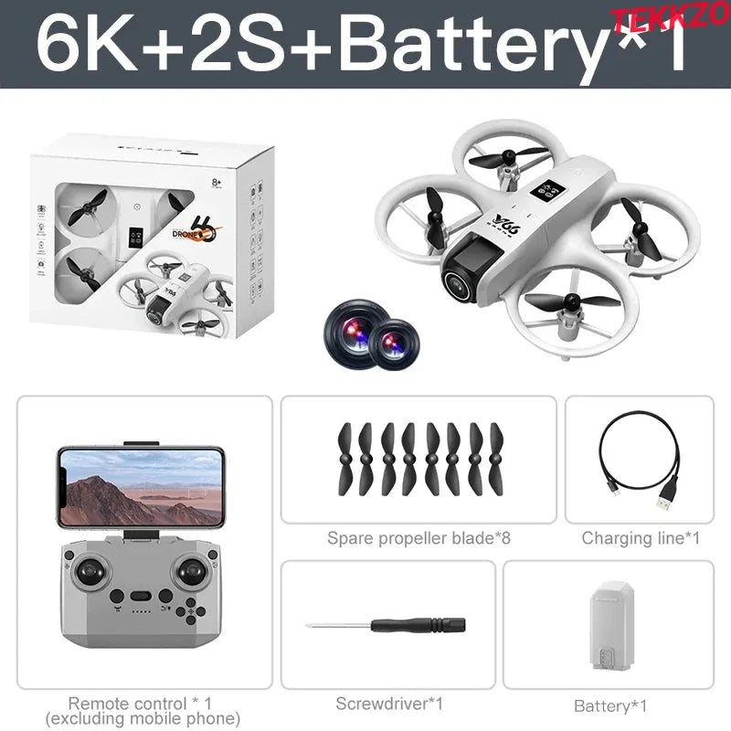 White 6K drone with 4 propellers, remote control, spare blades, charger cable, screwdriver, and battery