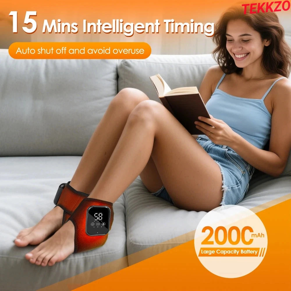 Woman sitting on gray sofa reading a book wearing red ankle massager with digital display