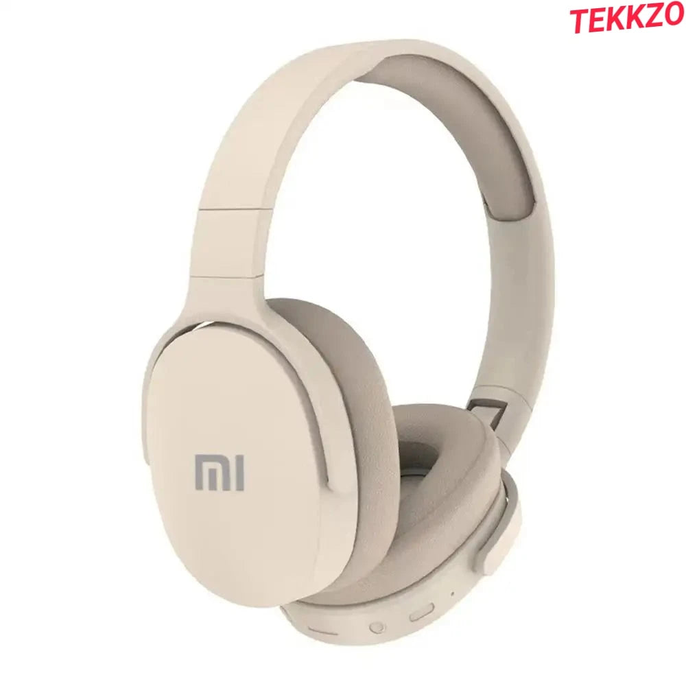 Beige over-ear wireless headphones with padded ear cushions and Mi logo on ear cup