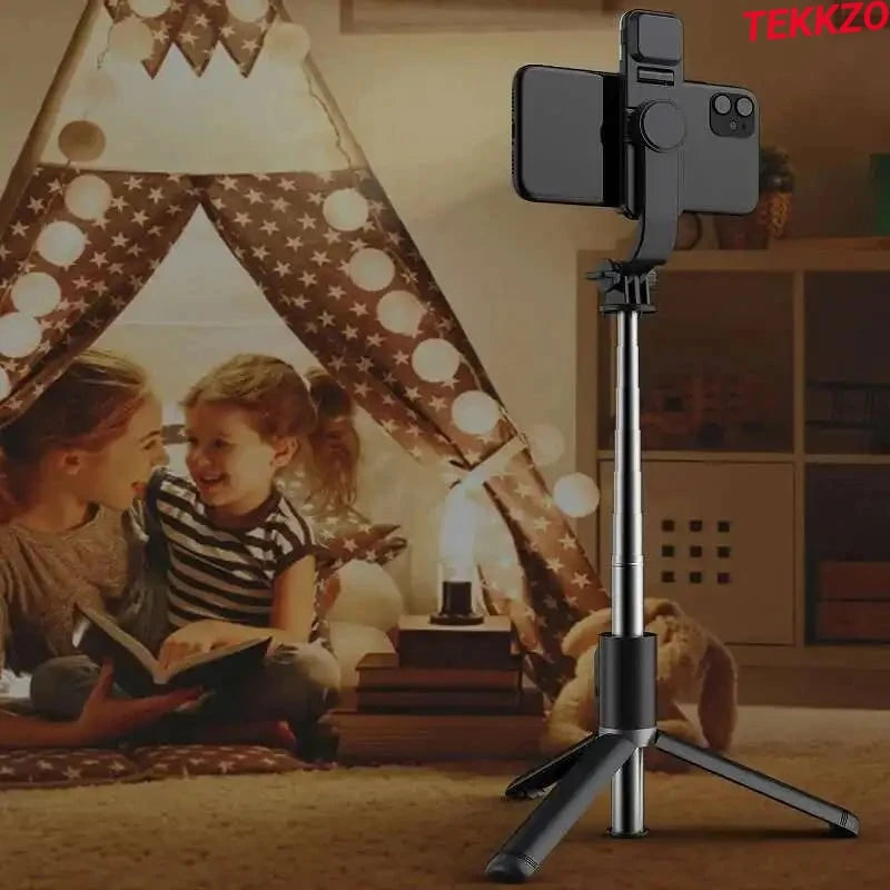 Black smartphone tripod with adjustable mount in cozy kids' playroom with teepee and warm lights