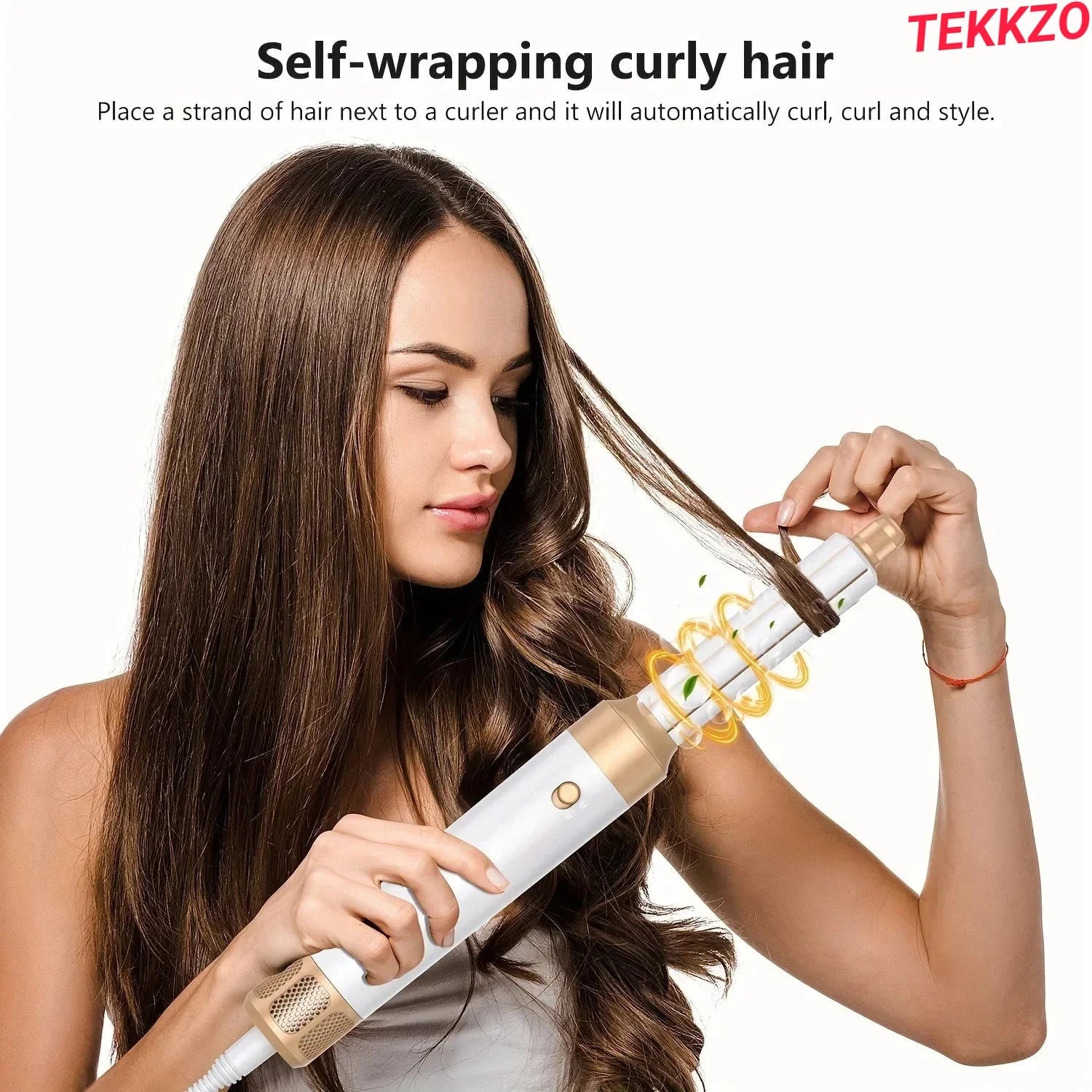 Woman using automatic self-wrapping hair curler on long brown hair, styling curls